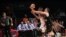 Nicolás Richotti (d) de Argentina disputa el balón con Jasiel Rivero (c) de Cuba el jueves 3 de septiembre de 2015, durante un juego del Torneo FIBA Américas en el Palacio de los Deportes en Ciudad de México.