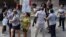 Momento del arresto el domingo de la líder de las Damas de Blanco, Berta Soler. (Angel Moya/Twitter)