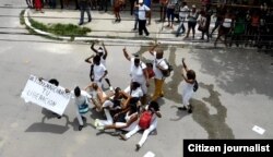 Represión contra Damas de Blanco Domingo 10 de julio Lawton La Habana