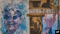Imágenes de Fidel y Raúl Castro en una pared de Cuba. Los Castro han estado en el poder desde enero de 1959.