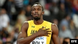 Bolt reacciona tras finalizar tercero en la final de 100 metros en el Mundial de Atletismo en Londres.