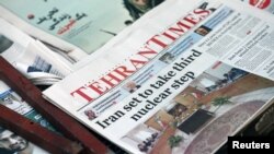 El tratado nuclear recogido en un periódico iraní. (Reuters).