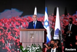 El primer ministro israelí, Benjamin Netanyahu, interviene en la ceremonia conmemorativa en el cementerio del Monte Herzl de Jerusalén, el lunes 5 de octubre de 2026. DEBBIE HILL/Pool vía REUTERS