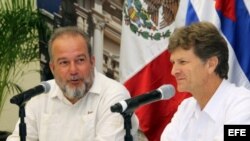 Ministros de Turismo de Cuba y México.