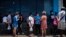 Cubanos en una cola para comprar alimentos durante la pandemia del coronavirus. AP Photo/Ramon Espinosa