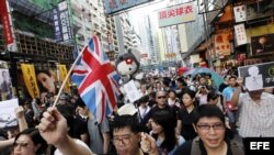 Manifestantes en Hong Kong con bandera inglesa. 