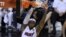 LeBron James y Ray Allen recuperaron terreno en el último parcial del sexto partido de las finales de la NBA para empatar y luego derrotar a los Spurs de San Antonio en tiempo extra.