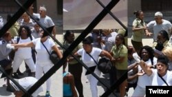 Fuerzas represivas detienen a Berta Soler y otras Damas de Blanco este domingo en la sede del movimeinto opositor en La Habana. (Fotos: Angel Moya)