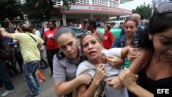 Eralides Frómeta, de grupo opositor Damas de Blanco, fue detenida en una marcha por el Día de los Derechos Humanos el 10 de diciembre de 2015, en La Habana.