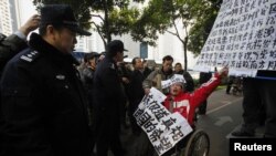 Manifestante en apoyo al censurado diario chino Southern Weekly en la ciduad de Guangzhou. 