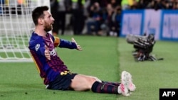El delantero argentino de Barcelona, Lionel Messi, celebra el tercer gol de su equipo durante la semifinal de la UEFA Champions League, partido de fútbol de ida entre Barcelona y Liverpool en el Camp Nou Stadium de Barcelona el 1 de mayo de 2019.