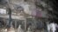 Vista parcial del atentado con bomba ocurrido este domingo en Pakistán.