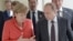 El presidente de Rusia, Vladimir Putin, y la canciller de Alemania, Angela Merkel.