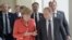 El presidente de Rusia, Vladimir Putin, y la canciller de Alemania, Angela Merkel.