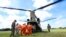 Personal de Protección Civil de Panamá y efectivos del Ejército estadounidense  descargando ayuda humanitaria transportada por un helicóptero Chinook del Comando Sur de EE. UU. en Penonomé, Panamá, el 10 de octubre de 2026.