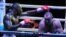 El boxeador cubano Erislandy Savón (i) se enfrente al ruso Vitaly Kudukhov hoy, viernes 6 de diciembre de 2013, durante una pelea por los 91 kgs de la IV Serie Mundial de Boxeo, en La Habana (Cuba). EFE/Ernesto Mastrascusa