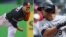 José Abreu (d) de los Medias Blancas de Chicago y José Fernandez (i) de Los Marlins de Miami.