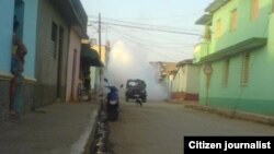 Reporta Cuba. Carros en Trinidad en labores de saneamiento. Foto: Maidín Carretero.