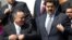 Diosdado Cabello, a la izquierda, junto al vicepresidente, Nicolás Maduro.
