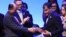 El presidente costarricense, Luis Guillermo Solís (i), y su ministro de Relaciones Exteriores, Manuel González (2-i), entregan la Presidencia pro tempore de la CELAC al mandatario ecuatoriano, Rafael Correa.