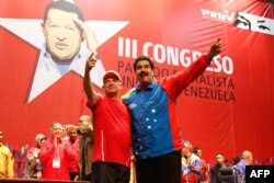 Hugo Carvajal junto a Nicolás Maduro (Archivo).