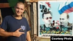 Afiche de Assad y Putin en las calles de Siria.