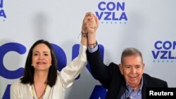 La líder de la oposición en Venezuela Maria Corina Machado junto al candidato de la Plataforma Unida Edmundo Gonzalez, en una conferencia de prensa en Caracas.