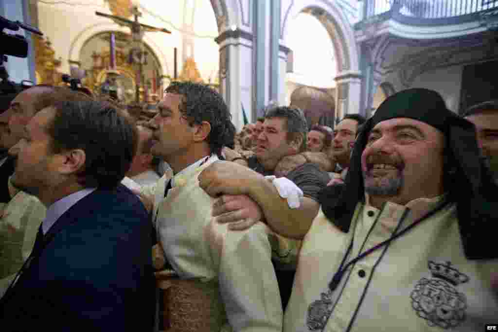 Antes de iniciarse el desfile procesional del Domingo de Ramos en Málaga.