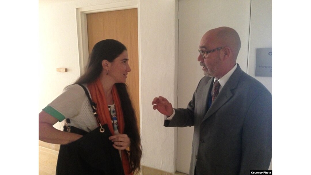 Yoani Sánchez y Humberto Castelló