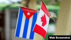 Banderas de Cuba y Canadá.