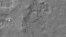 Fotografía facilitada por la NASA que muestra el descenso del vehículo explorador Curiosity en el planeta Marte el 6 de agosto de 2012. 