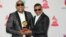 Gente de Zona posan con el Latin Grammy que recibieron en 2016. Tommaso Boddi / AFP
