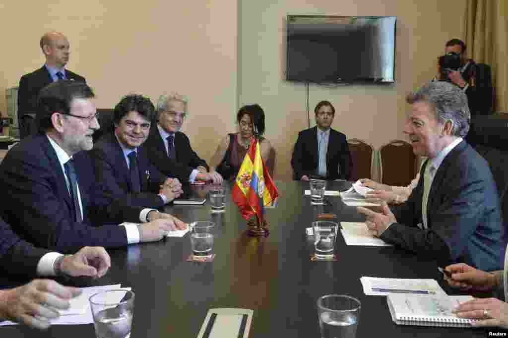 Primer Ministro espa&ntilde;ol Mariano Rajoy (I) y el presidente de Colombia Juan Manuel Santos (D) durante una reuni&oacute;n temprano este s&aacute;bado