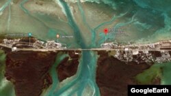 El globo rojo de posicionamiento a la entrada de Islamorada marca la zona (Whale Harbor) donde tocaron tierra seis cubanos procedentes de Matanzas.
