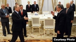 Putin y Raúl Castro en el Kremlin.