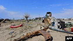 Imágenes del último reducto del grupo terrorista Estado Islámico, derrotado en Baghuz, Siria, el 23 de marzo de 2019. (Giuseppe Cacace/AFP/Archivo)