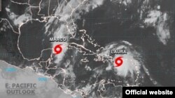 Cuba enfrenta por los dos extremos de la isla las tormentas tropicales “Marco”, en occidente, y “Laura”, en el oriente (Detalle de una imagen de satélite tomada a la 1:00 de la tarde del sábado por el Centro Nacional de Huracanes, con sede en Miami).