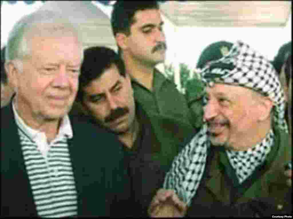 Jimmy Carter con Yasser Arafat