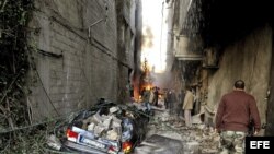 El escenario de un ataque con coche bomba en Yarmana, de mayoría drusa, en Damasco, Siria. 