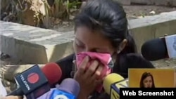 La esposa del chófer de la Embajada de Cuba asesinado habla para los medios de comunicación.