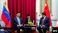 El presidente chino Xi Jinping y el mandatario venezolano Nicolás Maduro. Archivo.