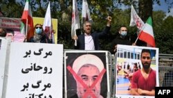 Protestas por la ejecución del atleta iraní Navid Afkari en Londres, la cuales generaron mucha actividad en los medios sociales, 20 de septiembre de 2020. (Justin Tallis / AFP).