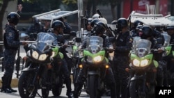 Fuerzas de seguridad desplegadas durante manifestación en Caracas. 