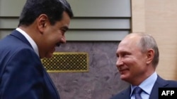 Vladimir Putin y Nicolás Maduro en una reunión en Novo-Ogaryovo en las afueras de Moscú el 5 de diciembre de 2018.