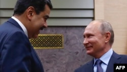 Vladimir Putin y Nicolás Maduro en una reunión en Novo-Ogaryovo en las afueras de Moscú. (Archivo)