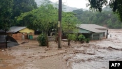 Inundaciones y destrozos provocados por el huracán Iota en Guatemala, el 18 de noviembre de 2020. (AFP Photo/Ejército de Guatemala).