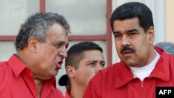 Nicolás Maduro (der.) y Eulogio Del Pino. 