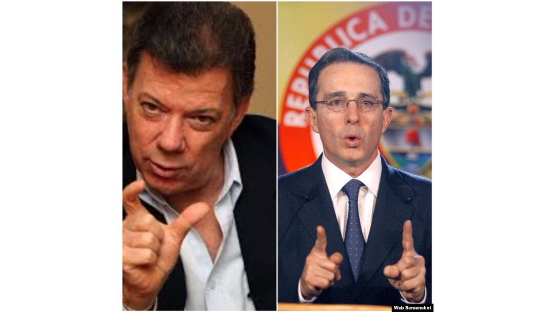 Juan Manuel Santos y Alvaro Uribe (Foto de archivo)