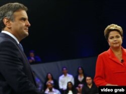 Aecio Neves (i) y Dilma Rousseff durante su último debate antes de la segunda vuelta electoral, el domingo 26.