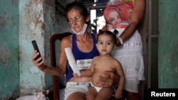 Cuba aprueba ensayo clínico en niños de vacuna contra COVID-19. (REUTERS/Alexandre Meneghini)